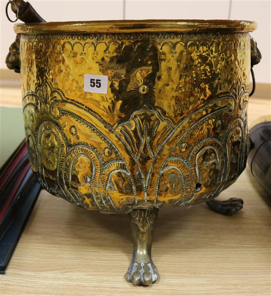 A Victorian brass log bin